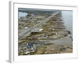 Beachfront Home Stands Among the Debris in Gilchrist, Texas after Hurricane Ike Hit the Area-null-Framed Photographic Print