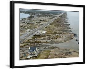 Beachfront Home Stands Among the Debris in Gilchrist, Texas after Hurricane Ike Hit the Area-null-Framed Photographic Print