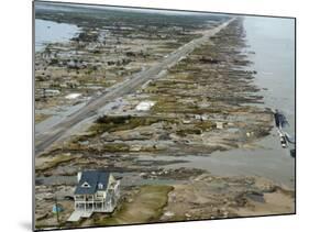 Beachfront Home Stands Among the Debris in Gilchrist, Texas after Hurricane Ike Hit the Area-null-Mounted Photographic Print