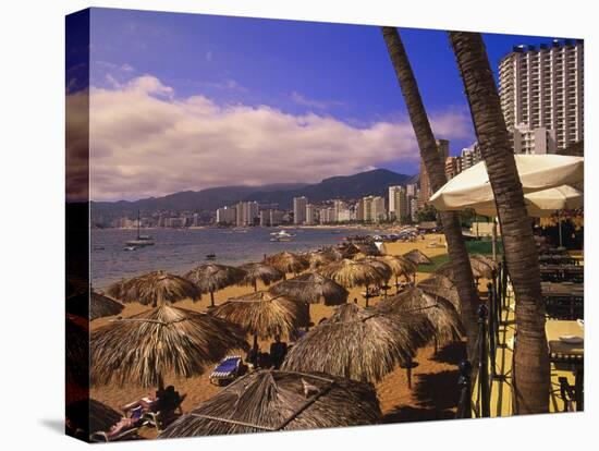 Beachfront Playa Icacos, Acapulco, Mexico-Walter Bibikow-Stretched Canvas