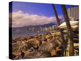 Beachfront Playa Icacos, Acapulco, Mexico-Walter Bibikow-Stretched Canvas