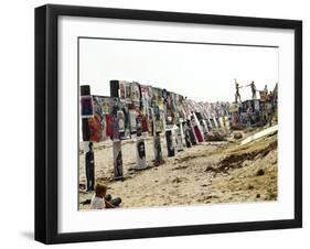 Beachgoers Climb on a Display of Posters, Montauk Point, Long Island, New York, 1967-Henry Groskinsky-Framed Photographic Print