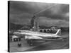 Beacon Shining Forth at Evening from Air Terminal Tower, American Airlines Plane in Foreground-null-Stretched Canvas