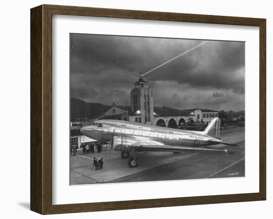 Beacon Shining Forth at Evening from Air Terminal Tower, American Airlines Plane in Foreground-null-Framed Photographic Print