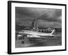 Beacon Shining Forth at Evening from Air Terminal Tower, American Airlines Plane in Foreground-null-Framed Photographic Print