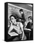 Beard Started on Teenage High School Student as Others Work on Lessons at blackboard and desk-Alfred Eisenstaedt-Framed Stretched Canvas