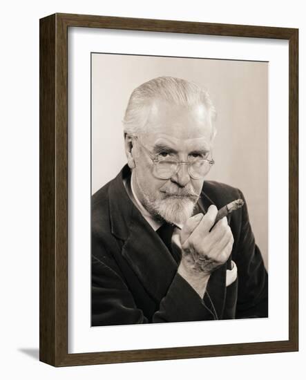 Bearded Man Holding a Cigar-Philip Gendreau-Framed Photographic Print