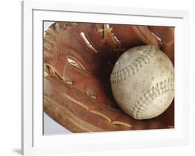 Beaten-Up Baseball in Baseball Glove-null-Framed Photographic Print