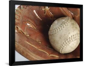 Beaten-Up Baseball in Baseball Glove-null-Framed Photographic Print