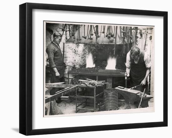 Beating an Iron Rod on an Anvil Having First Softened the Metal in the Roaring Furnace-null-Framed Art Print