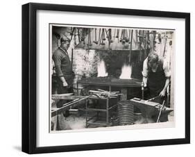 Beating an Iron Rod on an Anvil Having First Softened the Metal in the Roaring Furnace-null-Framed Art Print