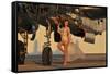 Beautiful 1940's Pin-Up Girl Standing with a B-25 Bomber-null-Framed Stretched Canvas