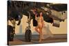 Beautiful 1940's Pin-Up Girl Standing with a B-25 Bomber-null-Stretched Canvas