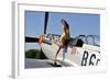 Beautiful 1940's Style Pin-Up Girl Posing with a P-51 Mustang-null-Framed Photographic Print