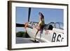 Beautiful 1940's Style Pin-Up Girl Posing with a P-51 Mustang-null-Framed Photographic Print