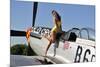 Beautiful 1940's Style Pin-Up Girl Posing with a P-51 Mustang-null-Mounted Photographic Print