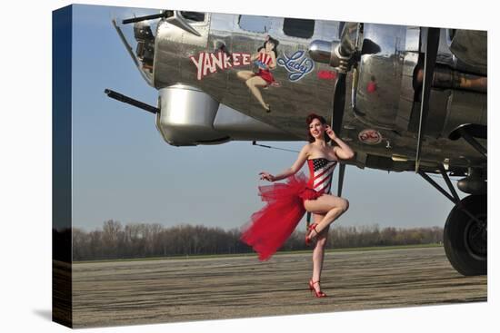 Beautiful 1940's Style Pin-Up Girl Standing in Front of a B-17 Bomber-null-Stretched Canvas