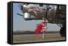 Beautiful 1940's Style Pin-Up Girl Standing in Front of a B-17 Bomber-null-Framed Stretched Canvas