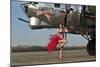 Beautiful 1940's Style Pin-Up Girl Standing in Front of a B-17 Bomber-null-Mounted Photographic Print