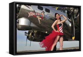 Beautiful 1940's Style Pin-Up Girl Standing under a B-17 Bomber-null-Framed Stretched Canvas