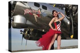 Beautiful 1940's Style Pin-Up Girl Standing under a B-17 Bomber-null-Stretched Canvas