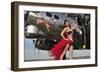 Beautiful 1940's Style Pin-Up Girl Standing under a B-17 Bomber-null-Framed Premium Photographic Print