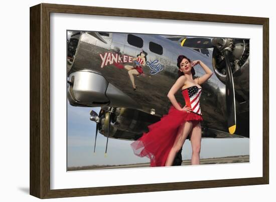 Beautiful 1940's Style Pin-Up Girl Standing under a B-17 Bomber-null-Framed Photographic Print