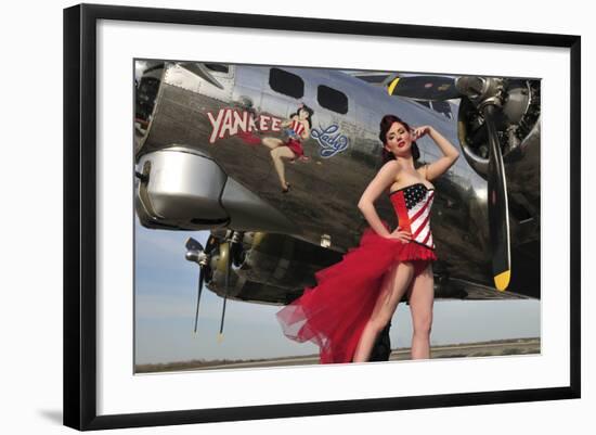 Beautiful 1940's Style Pin-Up Girl Standing under a B-17 Bomber-null-Framed Photographic Print