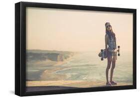 Beautiful And Fashion Young Woman Posing With A Skateboard-iko-Framed Poster