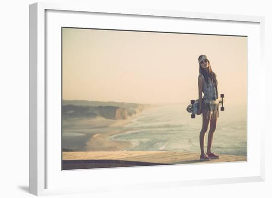 Beautiful And Fashion Young Woman Posing With A Skateboard-iko-Framed Art Print