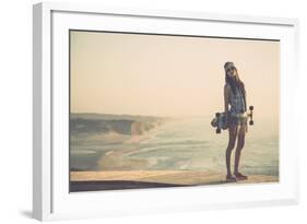 Beautiful And Fashion Young Woman Posing With A Skateboard-iko-Framed Art Print