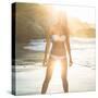 Beautiful Blonde in White Bikini at the Beach with Wet Hair on a Sunny Day-Wavebreak Media Ltd-Stretched Canvas