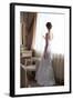 Beautiful Bride in White Wedding Dress Standing in Her Bedroom and Looking in Window-Malyugin-Framed Photographic Print