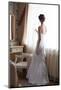 Beautiful Bride in White Wedding Dress Standing in Her Bedroom and Looking in Window-Malyugin-Mounted Photographic Print