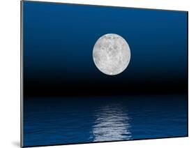 Beautiful Full Moon Against a Deep Blue Sky over the Ocean-null-Mounted Art Print