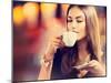 Beautiful Girl Drinking Tea or Coffee in Café-Subbotina Anna-Mounted Photographic Print