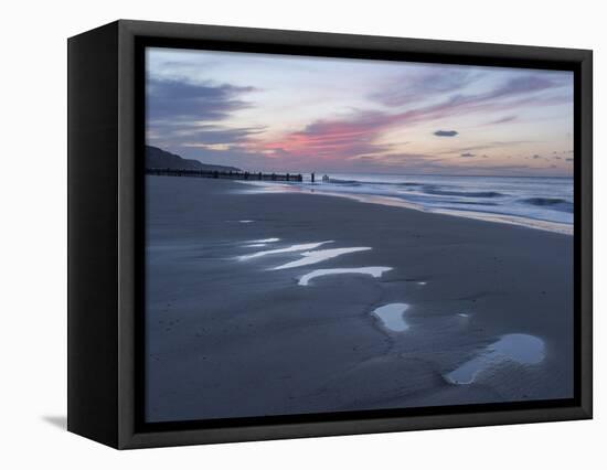 Beautiful sunset colours over the beach at low tide at Mundesley, Norfolk, England, United Kingdom,-Jon Gibbs-Framed Stretched Canvas