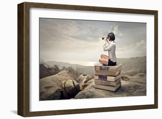 Beautiful Woman Sitting On A Pile Of Old Books Watching With Binoculars-olly2-Framed Premium Giclee Print