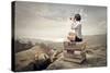 Beautiful Woman Sitting On A Pile Of Old Books Watching With Binoculars-olly2-Stretched Canvas