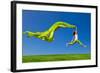 Beautiful Young Woman Jumping On A Green Meadow With A Colored Tissue-iko-Framed Photographic Print