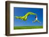 Beautiful Young Woman Jumping On A Green Meadow With A Colored Tissue-iko-Framed Photographic Print