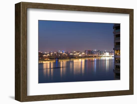 Beautifully illuminated high rises on Qiantang River in Hangzhou, Zhejiang province, China, Asia-Andreas Brandl-Framed Photographic Print