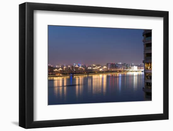 Beautifully illuminated high rises on Qiantang River in Hangzhou, Zhejiang province, China, Asia-Andreas Brandl-Framed Photographic Print