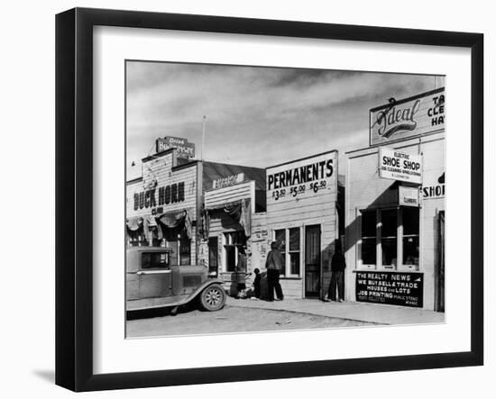 Beauty Parlor Advertising: Permanents: $3.50, $5.00 and $6.50, Shack Town, Fort Peck Dam-Margaret Bourke-White-Framed Photographic Print