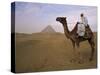 Bedouin Camel Rider in Front of Pyramid of Djoser, Egypt, North Africa-Staffan Widstrand-Stretched Canvas