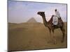 Bedouin Camel Rider in Front of Pyramid of Djoser, Egypt, North Africa-Staffan Widstrand-Mounted Photographic Print