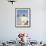 Bedouin Man Kneels on Top of a Sand Dune in the Desert-John Warburton-lee-Framed Photographic Print displayed on a wall