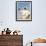 Bedouin Man Kneels on Top of a Sand Dune in the Desert-John Warburton-lee-Framed Photographic Print displayed on a wall