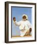 Bedouin Man Kneels on Top of a Sand Dune in the Desert-John Warburton-lee-Framed Photographic Print