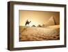 Bedouin on Camel near Pyramids in Desert-Givaga-Framed Photographic Print